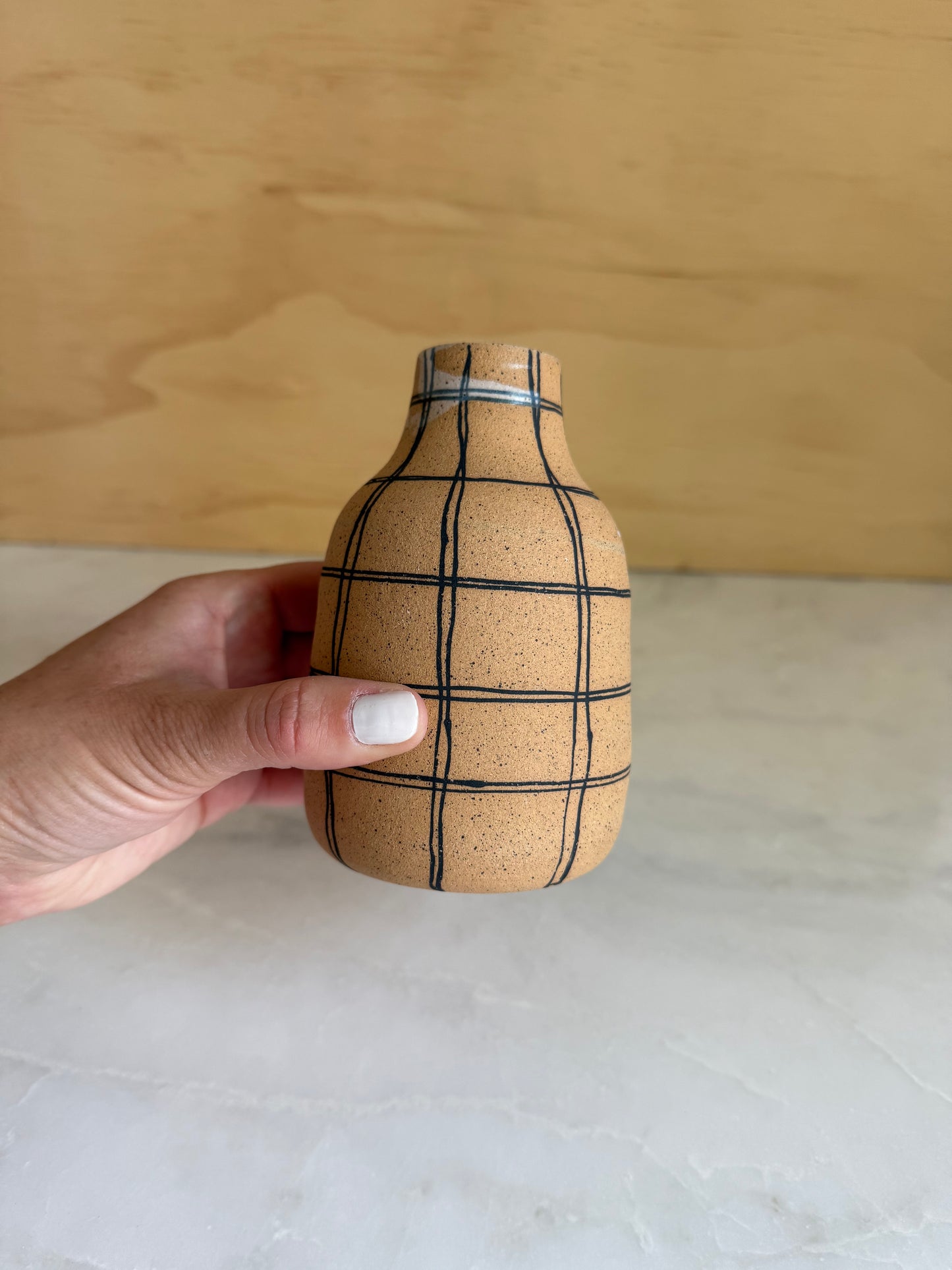 Handmade vase with painted stripes