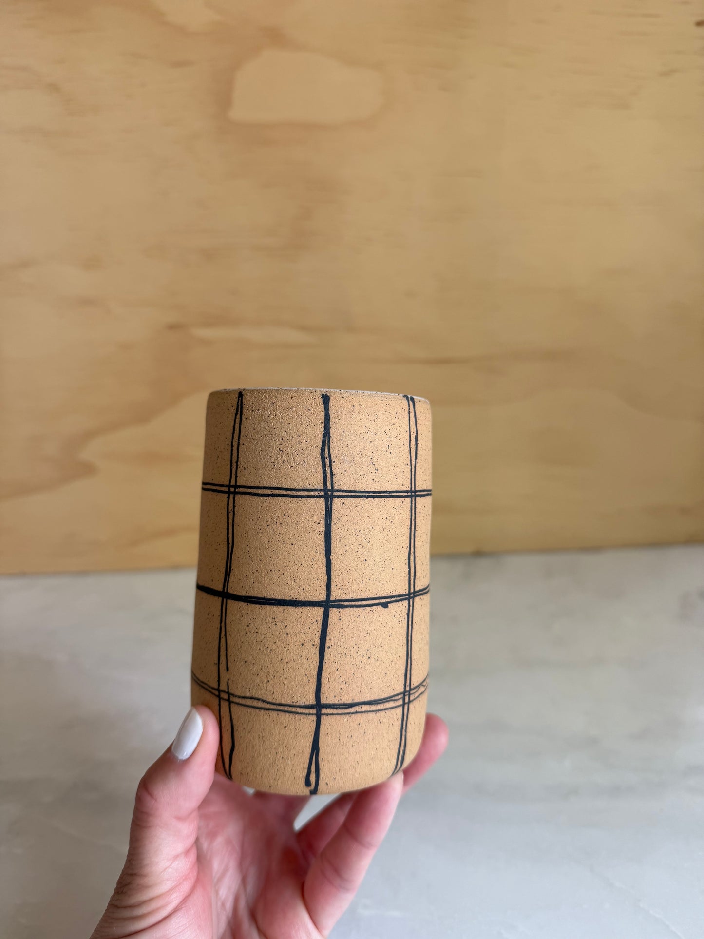 Handmade ceramic cylinder vase with hand painted plaid design