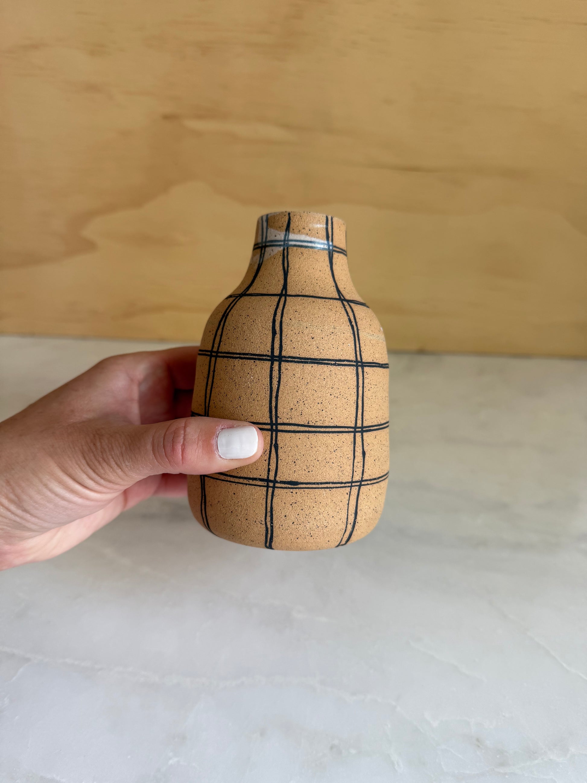 Handmade vase with painted stripes 